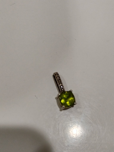Sterling silver pendant with peridot gemstone and marcasite accents