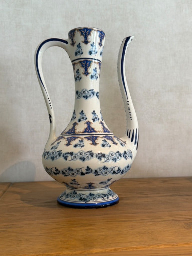 Porcelain ewer with blue floral decoration and pewter mounts