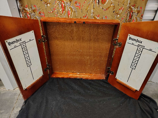 Wooden dartboard cabinet with scoreboard doors