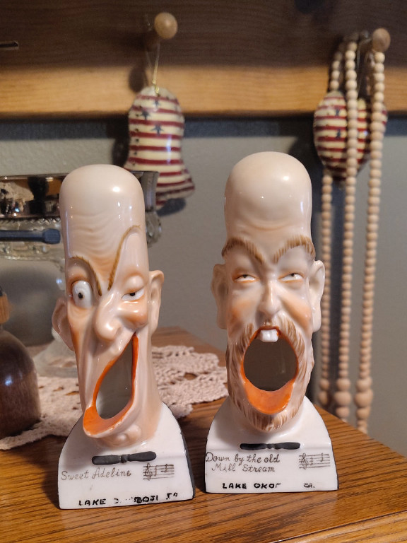 Porcelain figural head ashtrays by Schafer & Vater
