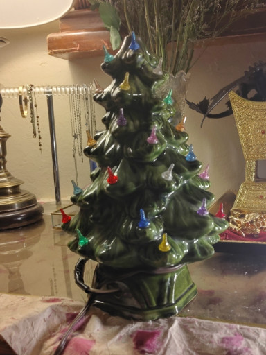 Vintage ceramic lighted Christmas tree with multicolored plastic bulbs