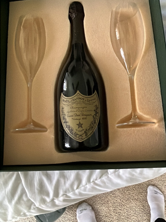 Champagne bottle of Dom Pérignon Vintage 1990 by Moët & Chandon with presentation box and glasses