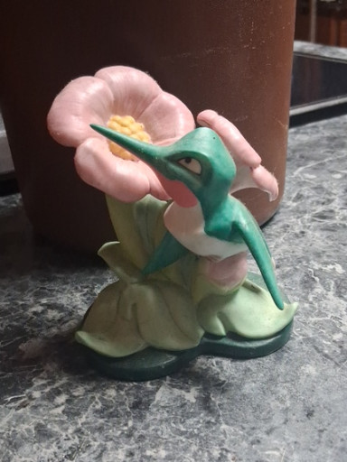 Porcelain figurine titled 'Flit the Hummingbird' from Disney's Pocahontas, made in Sri Lanka