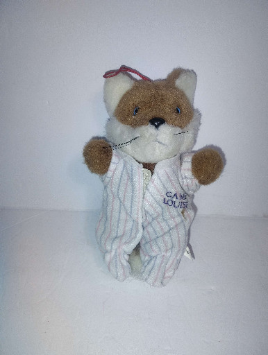 Plush fox puppet wearing striped pajamas, likely by Folkmanis