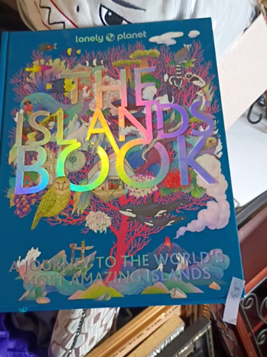Hardcover book titled 'The Islands Book' by Lonely Planet