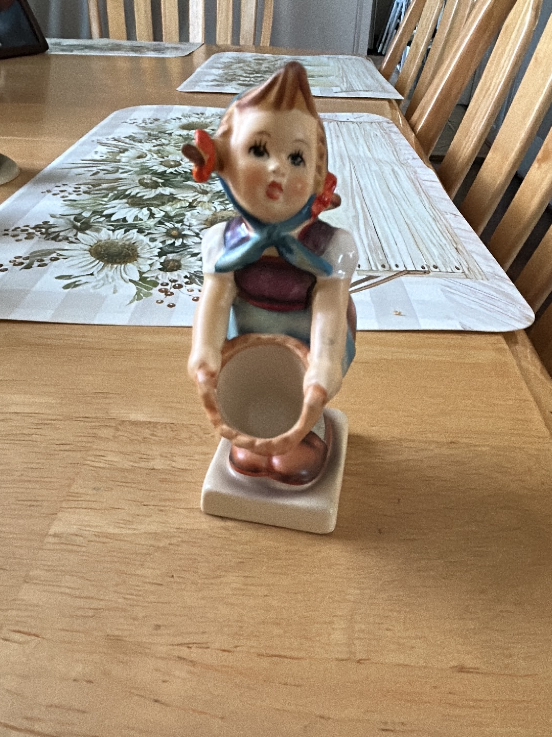 Porcelain figurine titled 'Little Helper' by Goebel Hummel