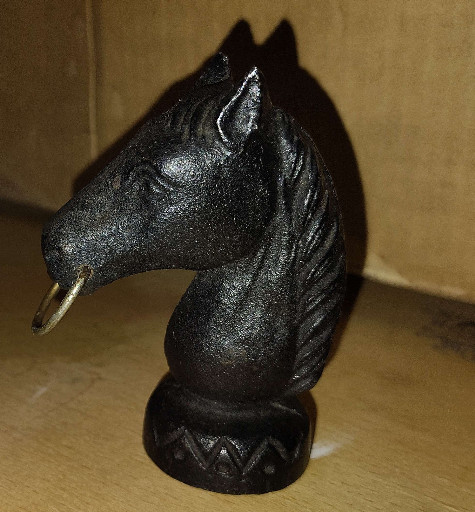 Cast iron horse head hitching post finial