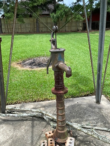 Cast iron hand water pump, vintage decorative garden piece
