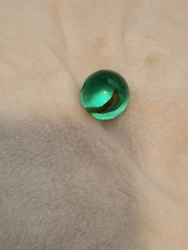 Green glass cabochon or gemstone