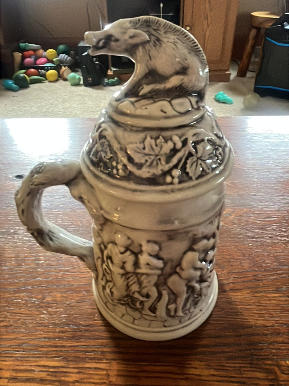Ceramic beer stein titled 'Great Dogs of the Outdoors' by Avon