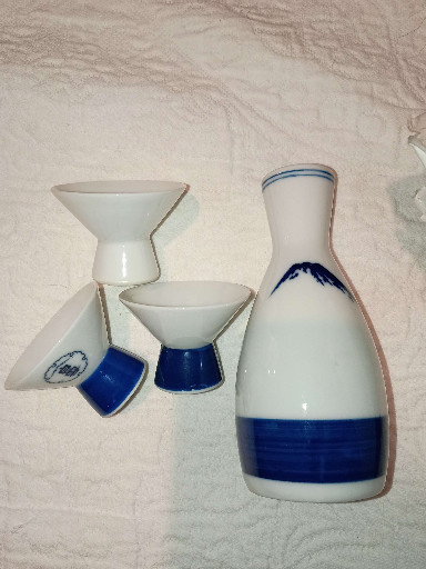 Porcelain sake set titled 'Shirayuki' by Japanese manufacturer