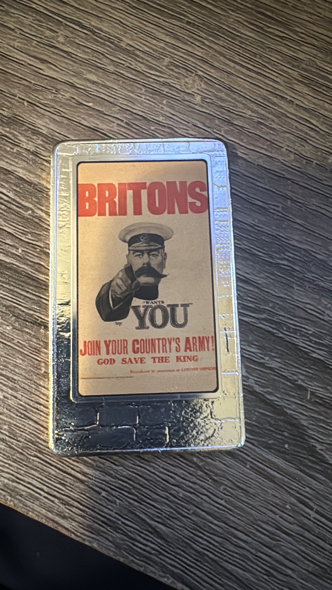 Commemorative metal ingot featuring the iconic 'Britons Wants You' WWI recruitment poster