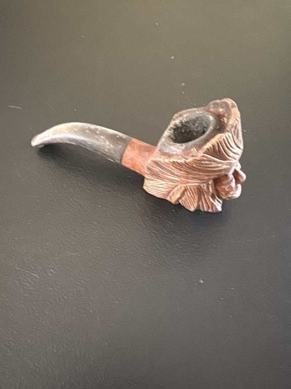 Hand-carved briar tobacco pipe with figural Native American head