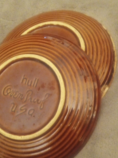 Ceramic plate with brown drip glaze by Hull Pottery, USA