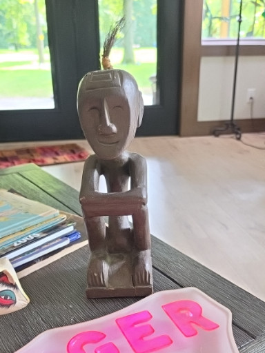 Hand-carved wooden ancestor figure from Timor, Indonesia