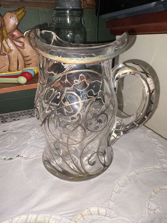 Glass pitcher with sterling silver overlay in Art Nouveau style
