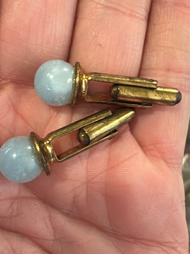 Pair of vintage gold-tone cufflinks with light blue cabochon stones