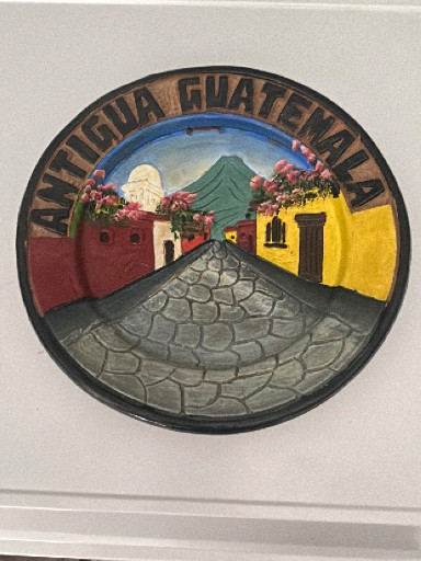 Hand-painted ceramic decorative plate titled 'Antigua Guatemala'