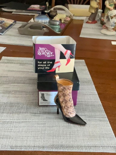 Collectible miniature shoe figurine titled 'Argyle Attitude' by Raine, from the 'Just The Right Shoe' series
