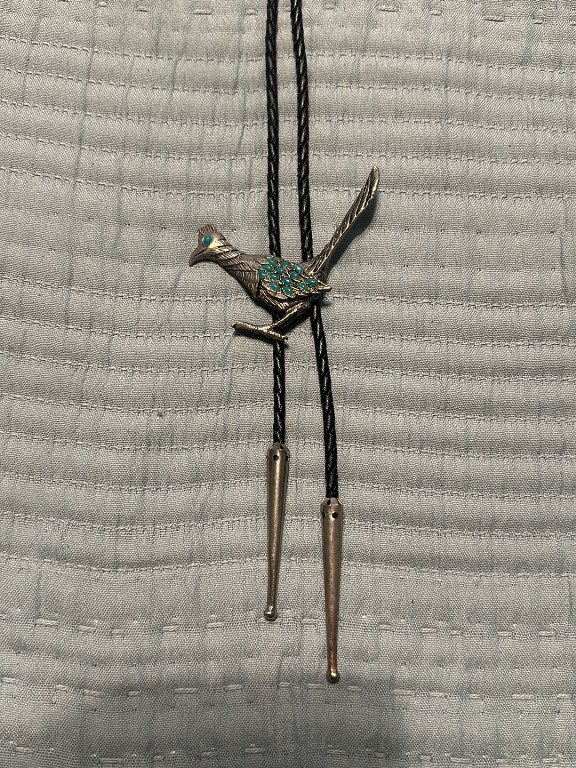 Sterling silver and turquoise inlay roadrunner bolo tie by Zuni artisan
