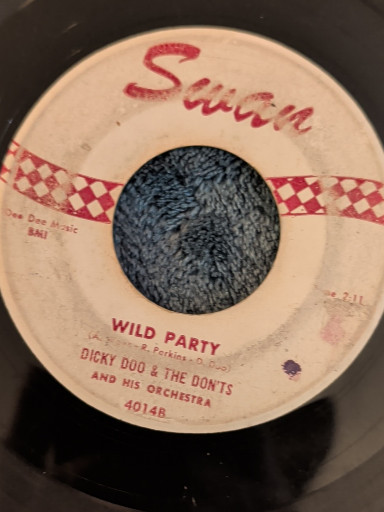 Vinyl 7-inch 45 RPM single titled 'Wild Party' and 'Leave Me Alone (Let Me Cry)' by Dicky Doo & The Don'ts on Swan Records