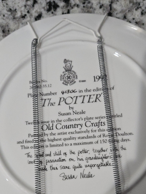 Royal Doulton collector plate titled 'The Potter' by Susan Neale