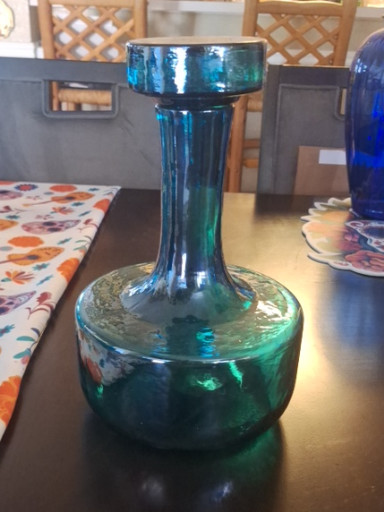 Vintage teal-green glass decanter or vase
