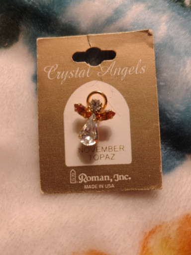 Crystal angel pin with amber topaz Austrian crystal by Roman, Inc.
