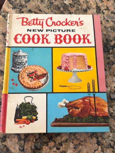 Hardcover cookbook titled 'Betty Crocker's New Picture Cook Book' published by General Mills