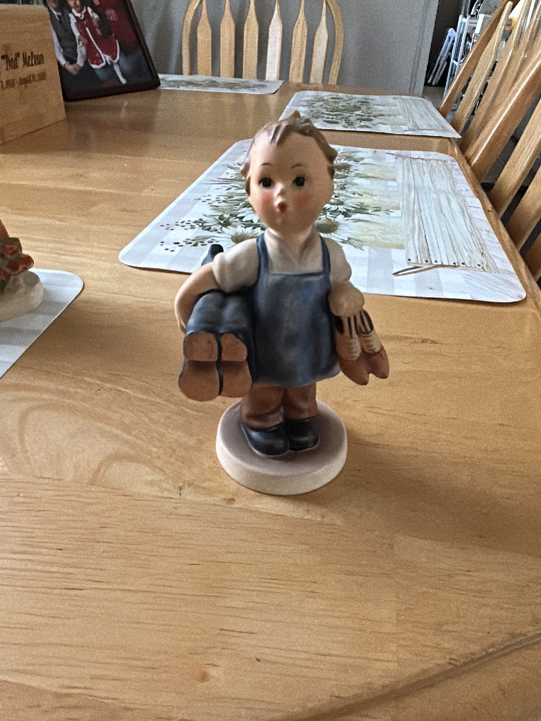 Porcelain figurine titled 'Boots' by Goebel Hummel