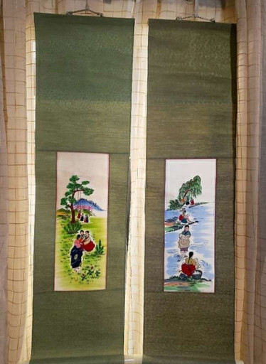 Pair of Korean hand-painted silk scroll paintings depicting rural scenes with figures and landscapes