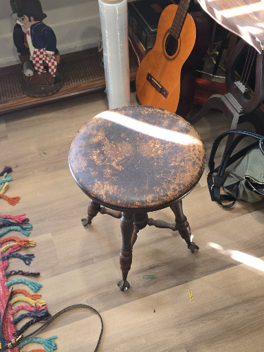 Victorian-era piano stool with adjustable seat and glass ball-and-claw feet by Charles Parker Company