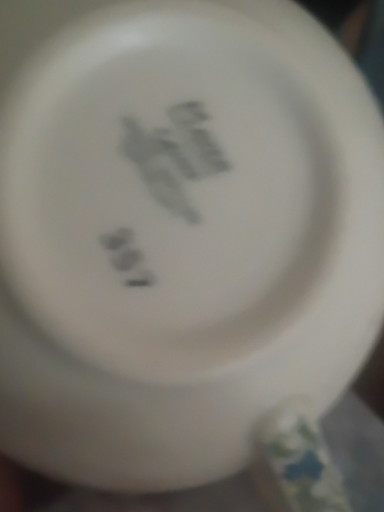 Porcelain plate or saucer with maker's mark