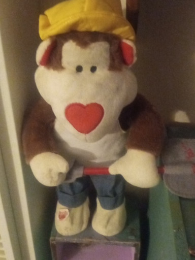 Animated plush sock monkey toy 'Funky Monkey' or similar dancing character, 16 inches tall