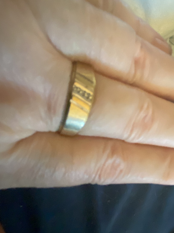 Gold-tone ring with channel-set stones