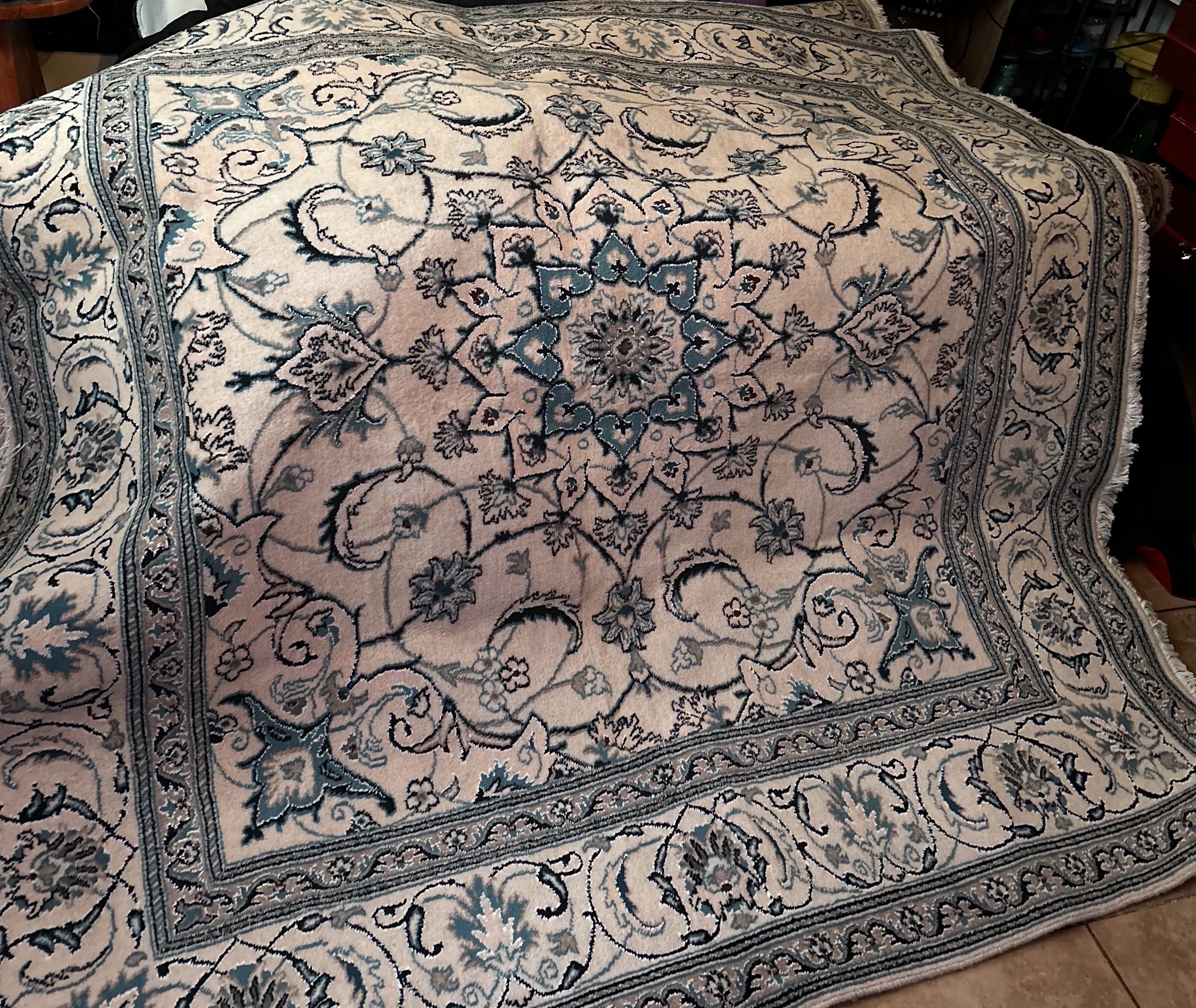 Wool Persian Nain rug with floral medallion design