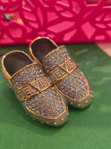 Decorative rhinestone-embellished shoe-shaped salt and pepper shakers inspired by Elvis Presley's 'Blue Suede Shoes'