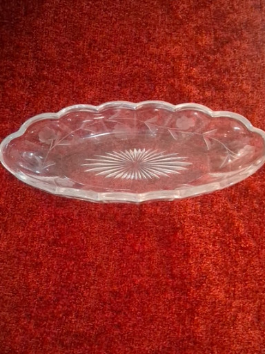 Clear pressed glass oval relish dish with Colonial pattern and sunburst base, attributed to Heisey Glass Company