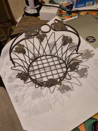 Silver-plated wire basket with grape and leaf decorative accents
