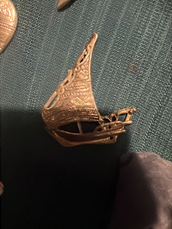Sterling silver filigree brooch depicting a Viking ship