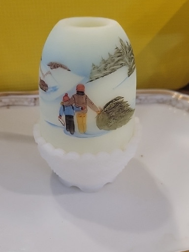 Hand-painted satin glass fairy lamp depicting winter scene with couple and evergreen trees by Fenton Art Glass
