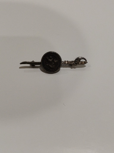 Sterling silver sword and shield brooch pin
