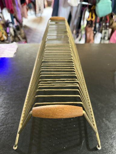 Brass wire record rack with wooden handle for 45 RPM vinyl records