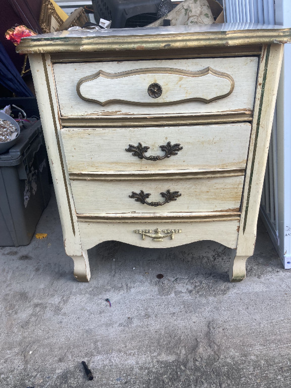 French Provincial style nightstand with cream-painted finish and gilt accents