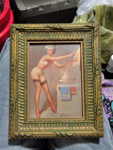 Reproduction print of mid-century pin-up art in ornate gilt frame