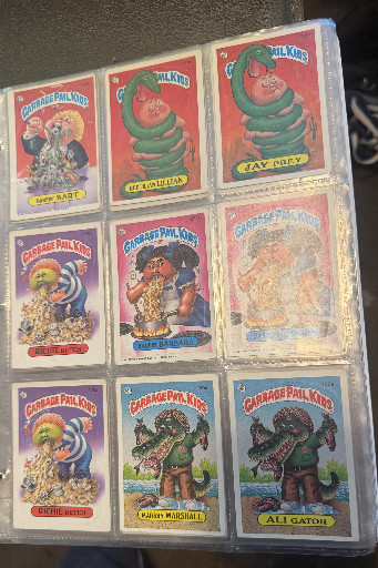 Collection of nine vintage Garbage Pail Kids trading cards by Topps