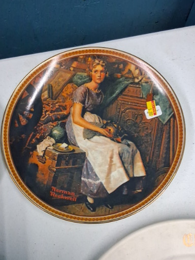 Collector plate titled 'Dreaming in the Attic' by Norman Rockwell, manufactured by Knowles