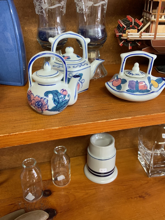 Porcelain miniature teapots with hand-painted floral designs by Ben Rickert