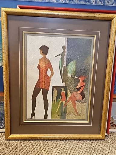Impression encadrée sur toile texturée représentant des figures féminines africaines stylisées
