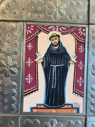 Hand-painted retablo titled 'St. Francis of Assisi' by Ruben Gallegos